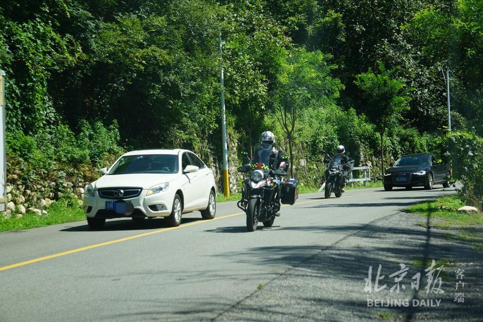 ����ɽ·����������Ť���衱���@ô�_Ħ��܇�^������